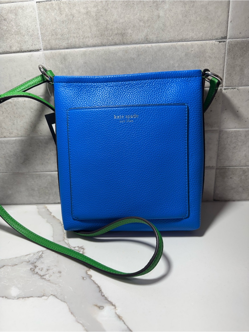 KATE SPADE NY Ava Colorblocked Swingpack Blue Pebbled leather with Green Strap